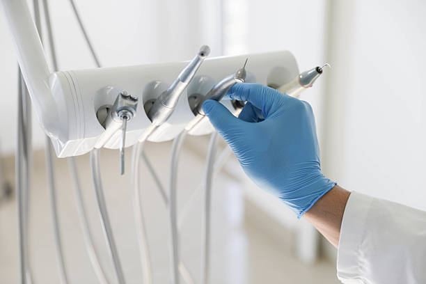 Professional Invisalign Clear Aligners technician working in Quincy, MA